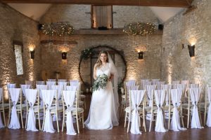 Bride in front of moongate in the aisle | Journey to the Centre of the Earth | modern ethereal winter styled bridal shoot by Hanami Dream | agate | marble | airplants | tulle | pale blue | gold | Oxleaze Barn | Gloucestershire | October 2017 | Photography by Squib Photography www.squibphotography.co.uk