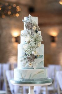 Close up of marble cake | Journey to the Centre of the Earth | modern ethereal winter styled bridal shoot by Hanami Dream | agate | marble | airplants | tulle | pale blue | gold | Oxleaze Barn | Gloucestershire | October 2017 | Photography by Squib Photography www.squibphotography.co.uk