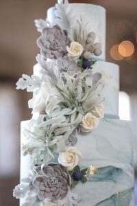 Sugar succulent cascade on marble cake | Journey to the Centre of the Earth | modern ethereal winter styled bridal shoot by Hanami Dream | agate | marble | airplants | tulle | pale blue | gold | Oxleaze Barn | Gloucestershire | October 2017 | Photography by Squib Photography www.squibphotography.co.uk