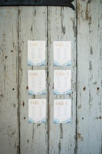 Table plan on blue wooden barn door | Journey to the Centre of the Earth | modern ethereal winter styled bridal shoot by Hanami Dream | agate | marble | airplants | tulle | pale blue | gold | Oxleaze Barn | Gloucestershire | October 2017 | Photography by Squib Photography www.squibphotography.co.uk