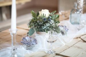 Candles and floral display on table | Journey to the Centre of the Earth | modern ethereal winter styled bridal shoot by Hanami Dream | agate | marble | airplants | tulle | pale blue | gold | Oxleaze Barn | Gloucestershire | October 2017 | Photography by Squib Photography www.squibphotography.co.uk