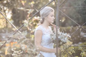 Bridesmaid deep in thought | Journey to the Centre of the Earth | modern ethereal winter styled bridal shoot by Hanami Dream | agate | marble | airplants | tulle | pale blue | gold | Oxleaze Barn | Gloucestershire | October 2017 | Photography by Squib Photography www.squibphotography.co.uk