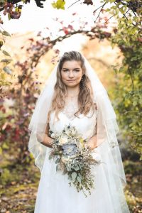 Close up of bride in the orchard | Journey to the Centre of the Earth | modern ethereal winter styled bridal shoot by Hanami Dream | agate | marble | airplants | tulle | pale blue | gold | Oxleaze Barn | Gloucestershire | October 2017 | Photography by Squib Photography www.squibphotography.co.uk